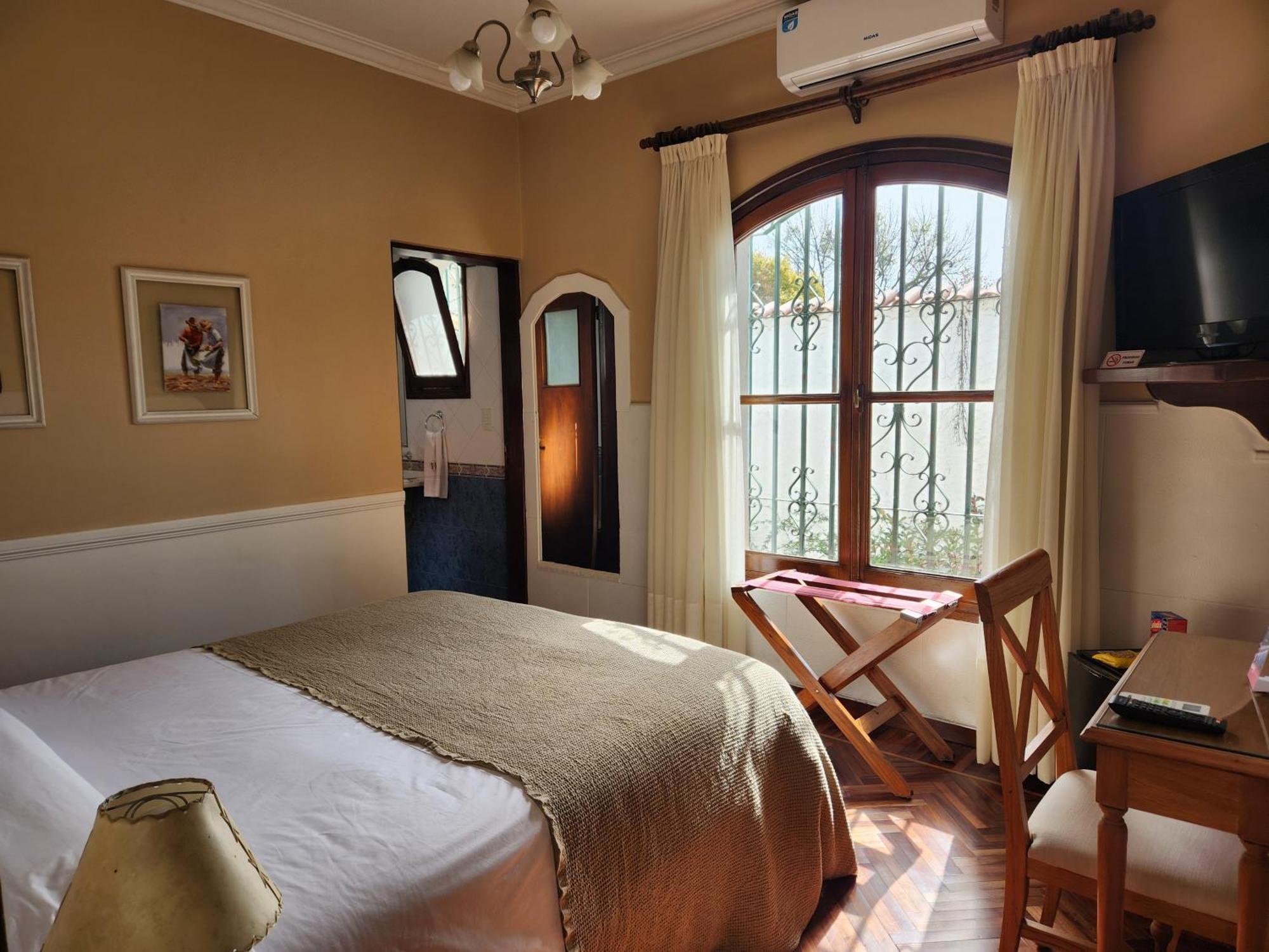 Hotel Boutique La Candela Salta Bagian luar foto