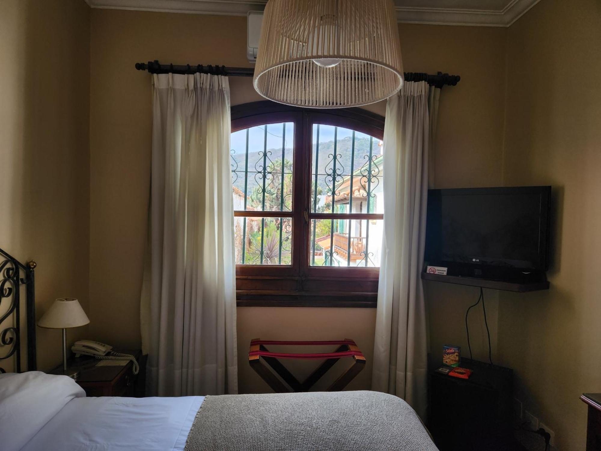 Hotel Boutique La Candela Salta Bagian luar foto